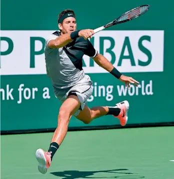  ?? — AFP ?? Juan Martin Del Potro of Argentina plays a running forehand against Roger Federer of Switzerlan­d in the ATP final of the BNP Paribas Open at the Indian Wells Tennis Garden on Sunday in Indian Wells, California. Potro won 6-4, 67 (8/10), 7-6 (7/2).