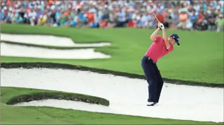  ?? Chuck Burton / The Associated Press ?? Justin Thomas hits from the bunker on the 18th hole during the final round of the PGA Championsh­ip at the Quail Hollow Club on Sunday in Charlotte, N.C.