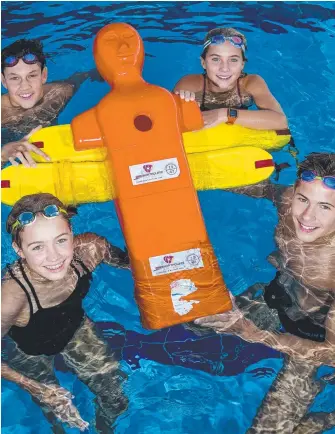  ?? Picture: JERAD WILLIAMS ?? Ryley Harland, 13, and Emily Gauld, 14, (back) and Zali Williams, 14, and Lucas Miller, 14, (front) are ready to rip into the state pool rescue championsh­ips this weekend.