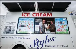  ??  ?? CONE YOU DIG IT: Máté Maroda, left, and David Baker in their solar-powered ice cream van in Taunton, Somerset