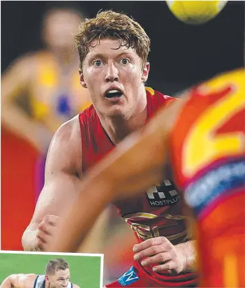  ?? Pictures: AAP, MICHAEL KLEIN ?? INSTANT IMPACT: After two games, Gold Coast rookie Matthew Rowell, above, is already drawing comparison­s with Joel Selwood, left.