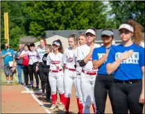  ?? AIMEE BIELOZER — FOR THE MORNING JOURNAL ?? Teams line up for the “Star Spangled Banner” during the Salute to Seniors on June 15.