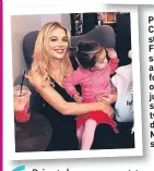  ??  ?? Pregnant Corrie star Helen Flanagan is sitting pretty as she smiles for the camera on a visit to a juice bar. Her squirming two-year-old daughter Matilda? Not so much...