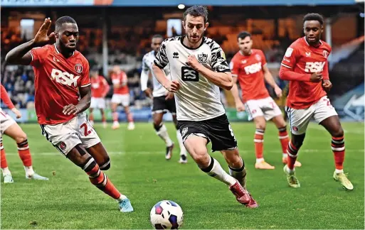  ?? ?? ON THE CHARGE: Ben Garrity strides forward for Vale in the 1-0 win against Charlton Athletic.