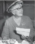  ?? ?? Mystery author Agatha Christie reads a telegram of congratula­tions on Sept. 12, 1957, for the 1,990th performanc­e of her play “The Mousetrap.”