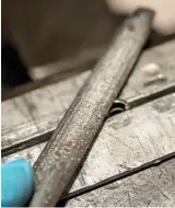  ??  ?? Filing the collet with a small half round hand file.