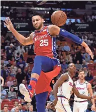  ?? USA TODAY SPORTS ?? 76ers guard Ben Simmons dunks the ball against Heat center Hassan Whiteside (21) during the first half at American Airlines Arena.