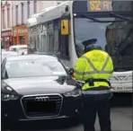  ??  ?? A traffic warden at work in Sligo.