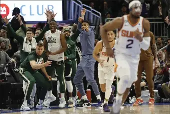  ?? JEFFREY PHELPS — THE ASSOCIATED PRESS ?? The Milwaukee Bucks bench reacts during the second half of an NBA basketball game against the Phoenix Suns, Sunday, Feb. 26, 2023, in Milwaukee.