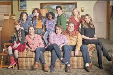  ?? Robert Trachtenbe­rg ABC ?? THE ENTIRE CAST of “Roseanne,” as well as the crew, will suffer the consequenc­es of its titular star’s racist comments. The sitcom’s cancellati­on, prompted by a tweet from Barr, center, has put all of them out of a job.