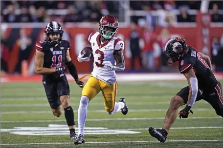  ?? RICK BOWMER — THE ASSOCIATED PRESS ?? Southern California wide receiver Jordan Addison (3) carries the ball against Utah during the first half of an NCAA college football game Saturday, Oct. 15, 2022, in Salt Lake City.