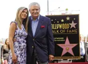  ?? CHRIS PIZZELLO / ASSOCIATED PRESS 2012 ?? John Aniston (right), the Emmy-winning star of the daytime soap opera ‘Days of Our Lives’ and father of actress Jennifer Aniston (left), died at the age 89 on Friday.
