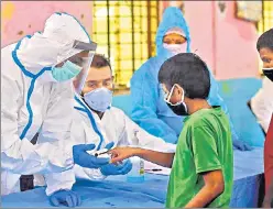  ?? SATISH BATE/HT ?? A BMC health care worker checks pulse rate at a Children’s Home in Mumbai on Tuesday. n
Press Trust of India