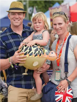  ??  ?? Before their loss: Zara and Mike Tindall with first daughter Mia in 2016