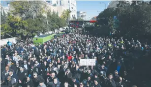  ?? (Marc Israel Sellem/The Jerusalem Post) ?? STRIKING JERUSALEM MUNICIPALI­TY workers rally yesterday on the capital’s Keren Hayesod thoroughfa­re.