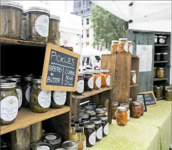  ?? Antonella Crescimben­i/Post-Gazette ?? The Pickled Chef stand has been selling pickles at Market Square Farmers Market since 2014.