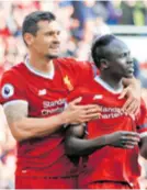  ??  ?? Dejan Lovren i Sadio Mane slave pobjedu Liverpoola