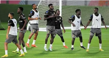  ?? ?? Working as a unit: Ghana players warming up at a training session at the aspire Zone in doha. — AFP