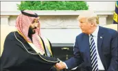  ?? Mandel Ngan/AFP/Getty Images ?? President Donald Trump shakes hands with Saudi Arabi’s Crown Prince Mohammed bin Salman in the Oval Office of the White House in March.