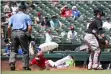  ?? ASSOCIATED PRESS FILE ?? Delino DeShields scores a run during the fifth inning last July vs. the Indians. DeShields, traded from the Rangers to the Indians in the offseason, has tested positive for the coronaviru­s, according to Indians president Chris Antonetti.