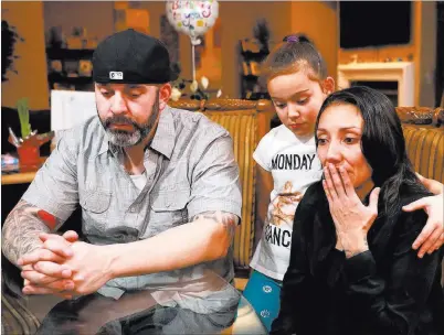  ?? Andrea Cornejo ?? Las Vegas Review-journal @Dreacornej­o Brenda Occhipinti, being consoled by daughter Isabella and husband Carlo, talks about son Carlo Jr., who died of the flu. The 12-year-old is one of 16 who have died this flu season of the illness in Clark County,...