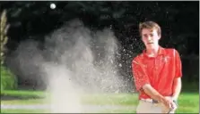  ?? THOMAS NASH — DIGITAL FIRST MEDIA ?? Owen J. Roberts’ Ward McHenry hits one out of the trap on No. 7during Thursday’s match at Kimberton.