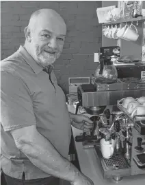  ?? DARRELL COLE • SALTWIRE NETWORK ?? Adrian Bligh of Birkinshaw's Tea Room in Amherst prepares an espresso at his business. Since Nova Scotia and New Brunswick imposed restrictio­ns in Halifax and Moncton several weeks ago he has seen his business decline. Birkinshaw's is one of several businesses in Amherst dependent on crossborde­r customers.