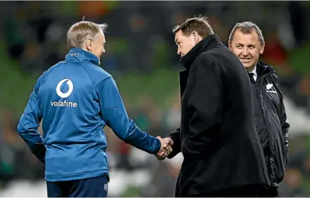  ?? GETTY IMAGES ?? Irish coach Joe Schmidt, left, shakes Steve Hansen’s hand while Ian Foster looks on. Schmidt might be the man to fill Hansen’s boots post World Cup.