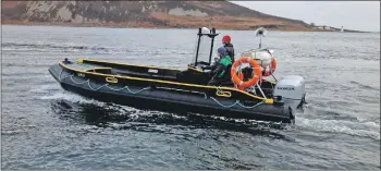  ?? 01_B42boat07 ?? An Arran Workboat hard at work at sea.