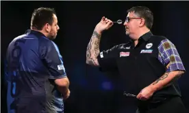  ?? Photograph: Kieran Cleeves/PA ?? Gary Anderson got the better of Adrian Lewis in their highly-anticipate­d second-round meeting.