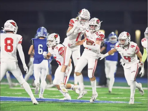  ?? Matthew Brown / Hearst Connecticu­t Media ?? Greenwich’s Tadeo Messenger (27) celebrates an intercepti­on against Darien in the first half in the Class LL quarterfin­als in 2019.