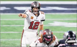  ?? KEVIN C. COX/GETTY ?? Tom Brady led the Tampa Bay Buccaneers back from a 24-7 3rd quarter deficit over Atlanta on Sunday. Famously, Brady led a second-half comeback for the Patriots from a 28-3 deficit against Atlanta in Super Bowl LI.