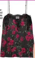  ??  ?? Silk lacetrimme­d camisole £77, CAMI NYC at net-aporter .com