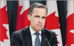  ?? CHRIS WATTIE/ REUTERS ?? Bank of Canada governor Mark Carney says he still expects ‘ modest’ growth of two per cent for the domestic economy in the coming year.