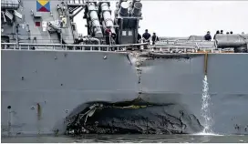 ?? U.S. NAVY VIA AP ?? Damage is visible in the destroyer USS John S. McCain after a collision in August. Adm. WilliamMor­an, the vice chief of naval operations, toldmember­s of the House Armed Services Committee that the Navy is “shocked” by recent collisions.