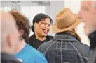  ?? H John Voorhees III / Hearst Connecticu­t Media ?? Mendi Blue Paca, CEO of Fairfield County Community Foundation, talks with attendees of the kickoff event for the 24-hour Giving Day held by the foundation. Held at the Norwalk Art Space on Thursday.