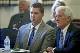  ?? CARA OWSLEY — THE CINCINNATI ENQUIRER VIA AP ?? Ray Tensing, center, and his defense attorney Stewart Mathews, right, listen to assistant prosecutor Stacey DeGraffenr­eid’s opening statement during Tensing’s retrial Thursday at the Hamilton County Courthouse in Cincinnati. During the opening...