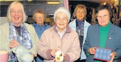  ??  ?? ●●Marian Fuller, Alma Chadwick, Elsie Davies, Barbara Brown and Joan Anderson manned the Mothers Union fundraisin­g stall at the flea market in the Rochdale Exchange Centre