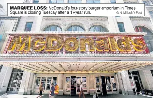  ?? G.N. Miller/NY Post ?? MARQUEE LOSS: McDonald’s four-story burger emporium in Times Square is closing Tuesday after a 17-year run.