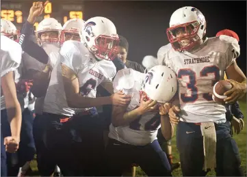  ?? RECORDER PHOTOS BY CHIEKO HARA ?? Strathmore High School's players celebrate after defeating Hilmar High School on Friday at Hilmar in the CIF North Regional Division 6-AA play-in game.