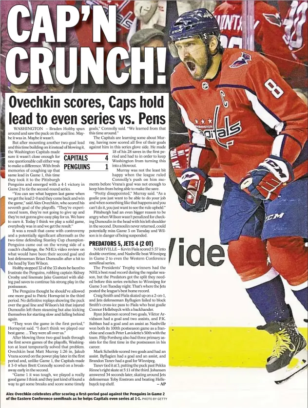  ??  ?? Alex Ovechkin celebrates after scoring a first-period goal against the Penguins in Game 2 of the Eastern Conference semifinals as he helps Capitals even series at 1-1.