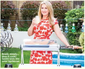  ?? ?? Ready, steady... does it cook? Tanith tests the solar barbecue