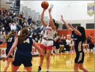  ?? AUSTIN HERTZOG - MEDIANEWS GROUP ?? Perkiomen Valley’s Julia Smith hits a jumper from the free-throw line against Spring-Ford during the PAC championsh­ip game on Feb. 15 at Perkiomen Valley.