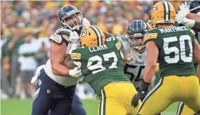  ?? BENNY SIEU / USA TODAY SPORTS ?? Kenny Clark, Blake Martinez and the rest of the Packers’ defense are eager to open up Mike Pettine’s playbook against the Bears.