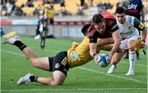  ?? GETTY IMAGES ?? George Bridge, pictured scoring a try against the Hurricanes in Wellington in April, won’t be back at the Crusaders for a seventh season next year.