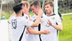  ?? James Smith ?? Michael Grogan ( second left) celebrates his goal against Glossop with George Lomax, Kev Pollard and Jamie Rainford.