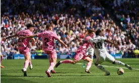  ?? Photograph: Ángel Martínez/Getty Images ?? Vinícius Júnior scores Real Madrid’s first goal in their comeback win over Espanyol.