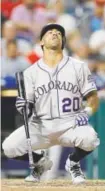  ?? Matt Slocum, The Associated Press ?? Colorado’s Ian Desmond laments after striking out against Philadelph­ia’s Aaron Nola during the seventh inning Tuesday night.