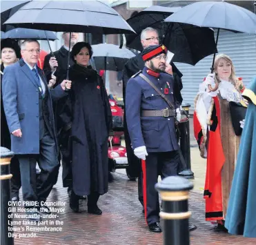  ??  ?? CIVIC PRIDE: Councillor Gill Heesom, the Mayor of Newcastle-underlyme takes part in the town’s Remembranc­e Day parade.