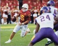  ?? David Purdy / Getty Images ?? Iowa State quarterbac­k Brock Purdy scrambles for yards under against Northern Iowaon Sunday in Ames, Iowa.